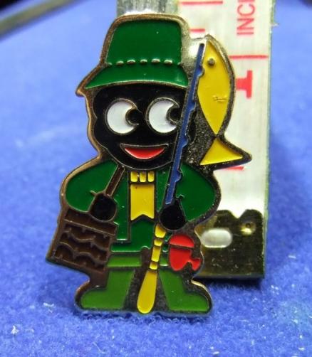 robertsons golly badge brooch angler fishing fisherman  1980s