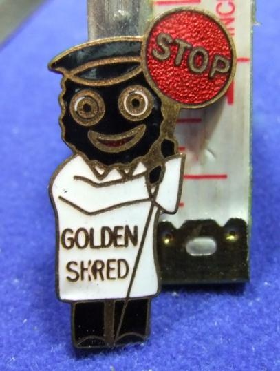 Robertsons jam golly badge lollipop man black feet black hands advert