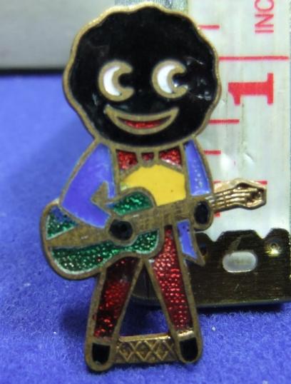 Robertson 1970s Golly Guitarist badge advertising