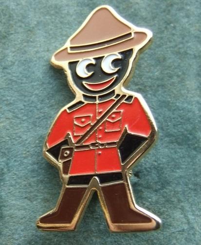 Robertsons Golly Mountie badge brooch 1980s
