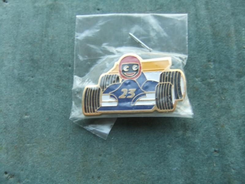 Robertsons golly badge brooch racing car driver no23